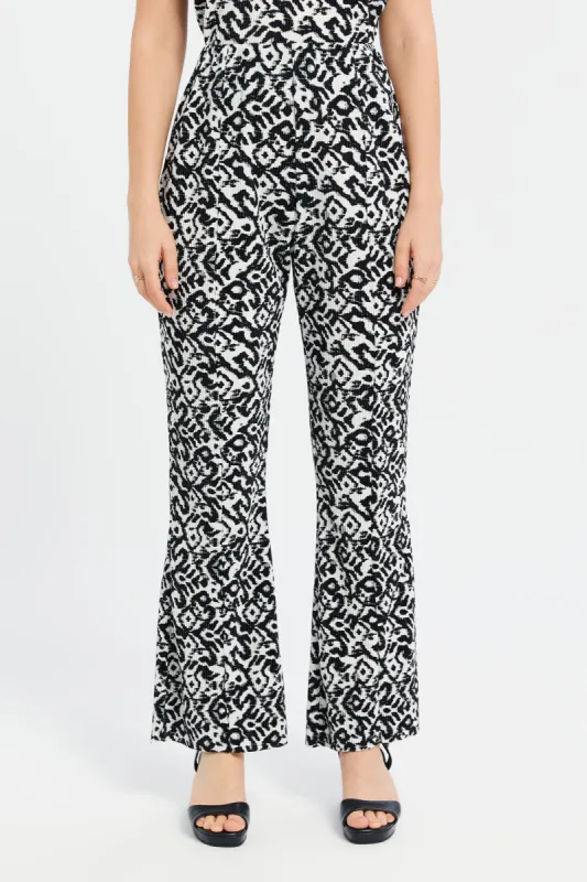 Women Black And White Printed Plisse Wide Leg Trouser sold by Redtag