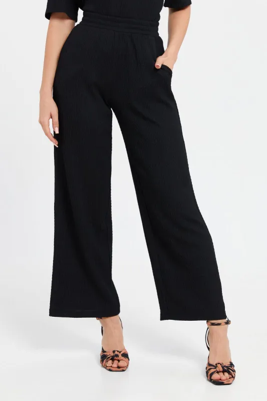 Women Black Textured Pants sold by Redtag