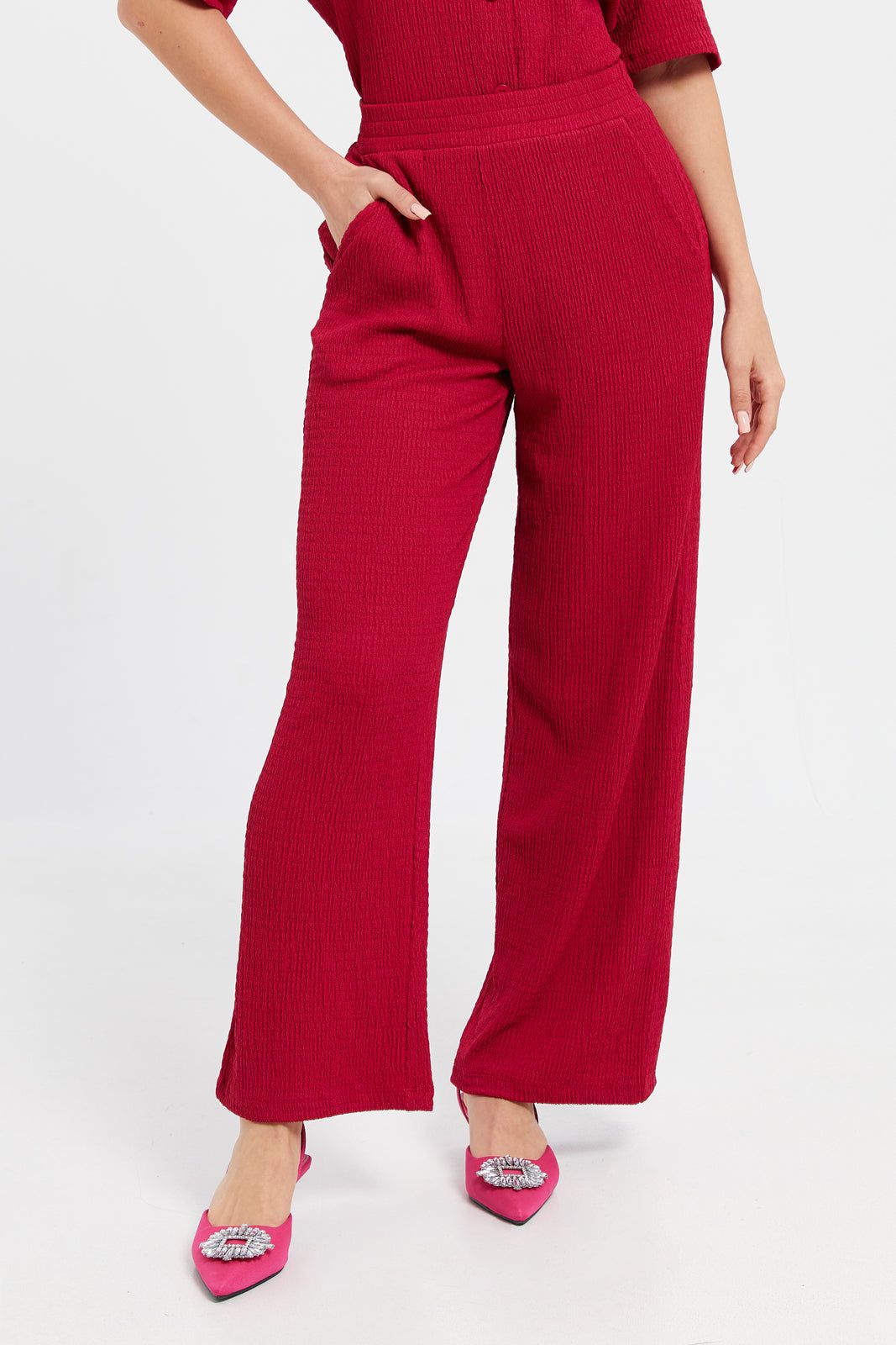 Women Fuchsia Textured Pants sold by Redtag