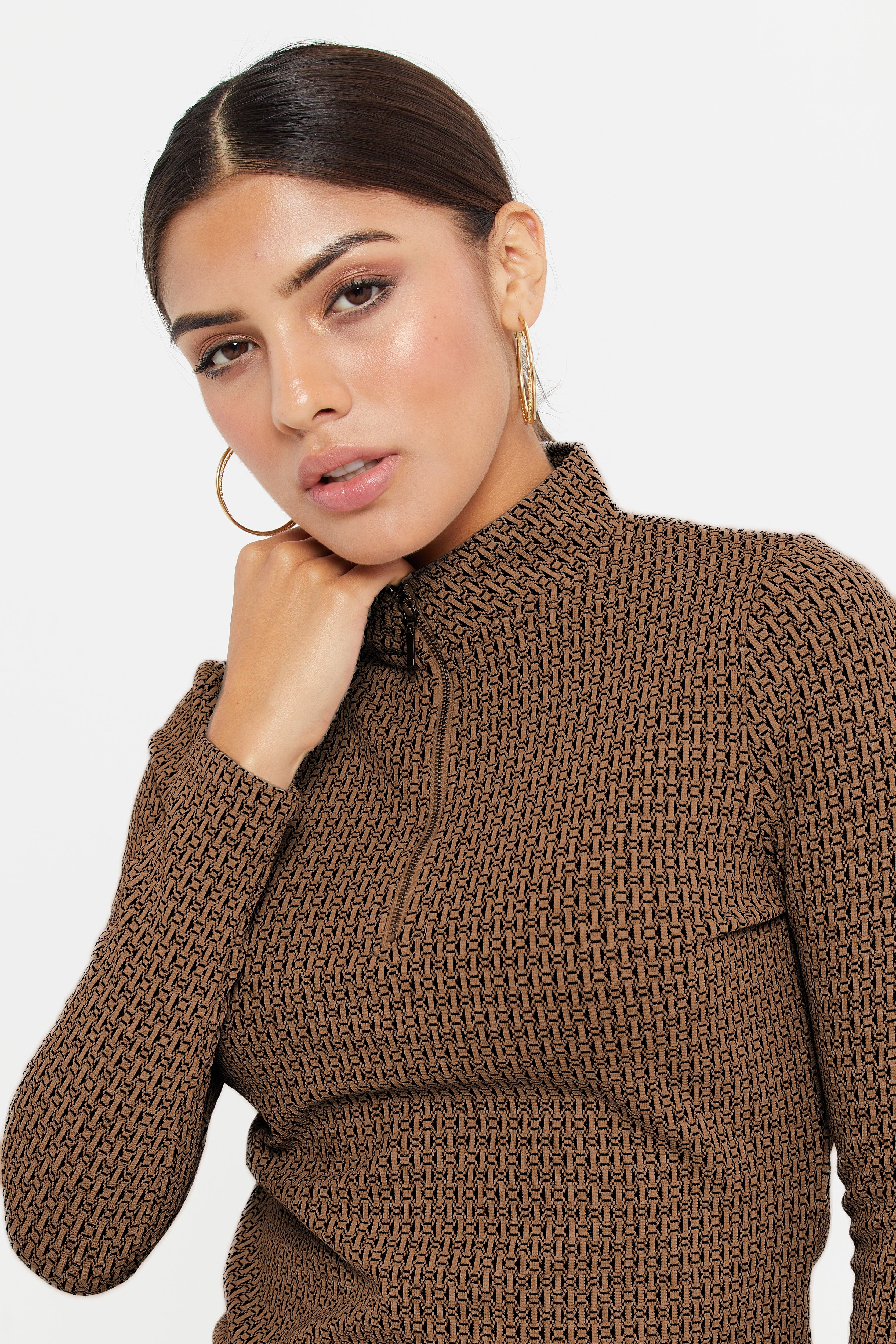 Women Brown Turtle Neck Top sold by Redtag