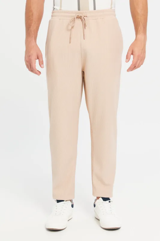 Men Beige Jogger Fit Trousers sold by Redtag