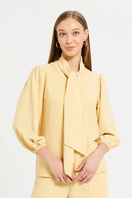 Women Yellow Textured Pussy Bow Blouse sold by Redtag
