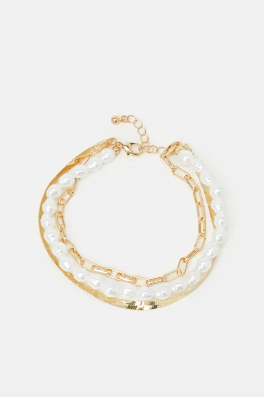 Women Gold And White Embellished Layered Anklet sold by Redtag