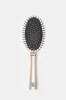 Women Pink Hair Brush sold by Redtag