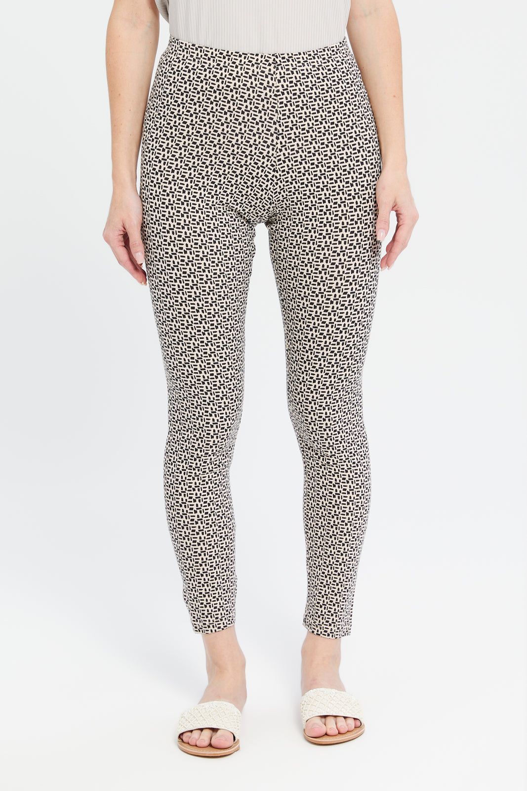 Women Beige And Black Printed Leggings sold by Redtag