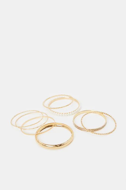 Women Gold Pearls Bangle Set (Pack of 8) sold by Redtag