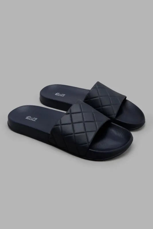 Navy Geometric Embossed Slide sold by Redtag