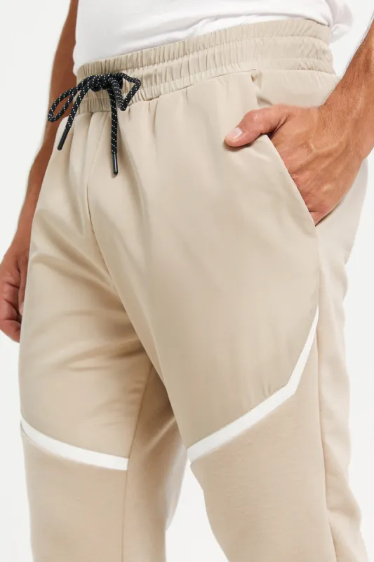 Men Beige Print Active Pants sold by Redtag