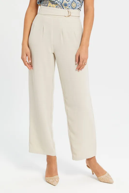 Women Beige Wide Leg Pleated Trousers sold by Redtag
