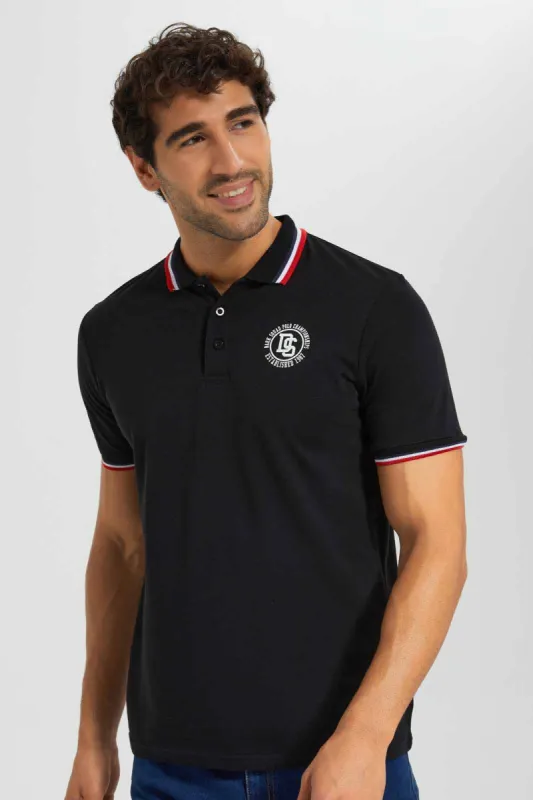 Black Polo T-shirt sold by Redtag