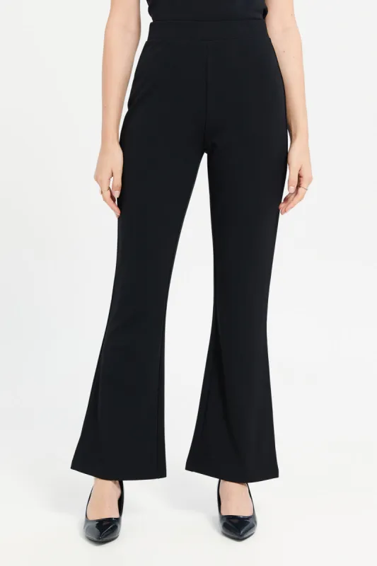 Women Black Flared Trousers sold by Redtag