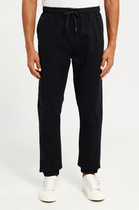 Men Black Solid Twill Jogger sold by Redtag