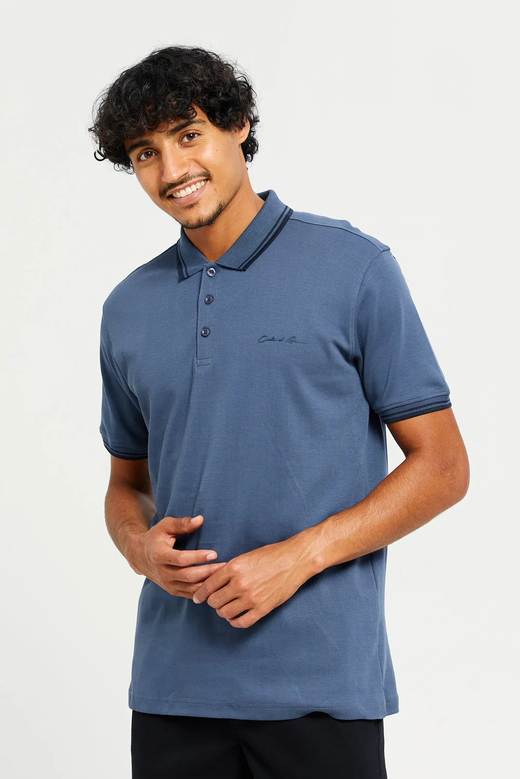 Men Blue Printed Polo Shirt sold by Redtag