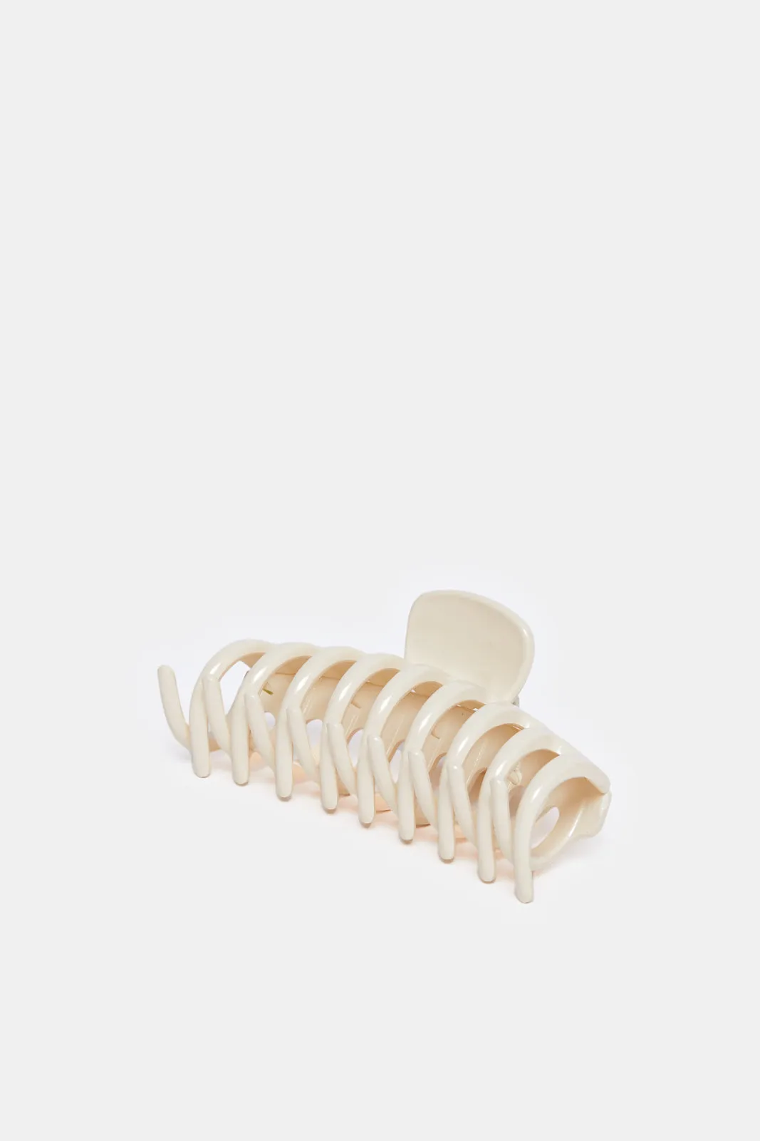 Women Beige Solid Hair Claw sold by Redtag