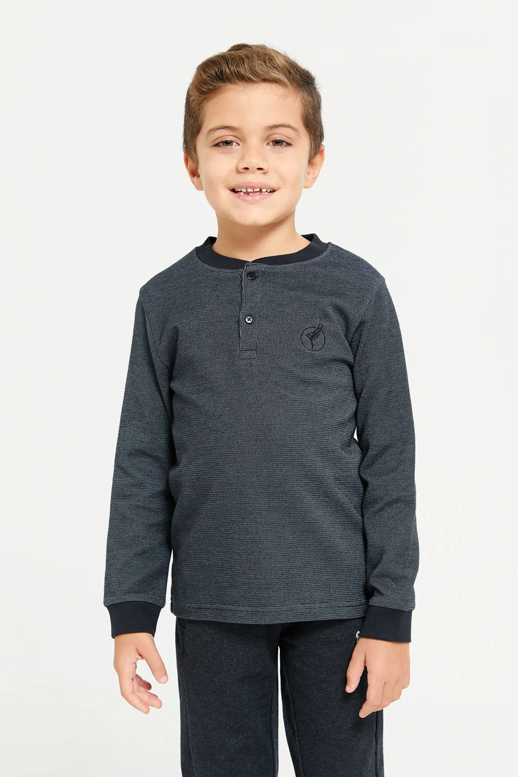 Boys Black Waffle Fabric Long Sleeve Henley Tee sold by Redtag
