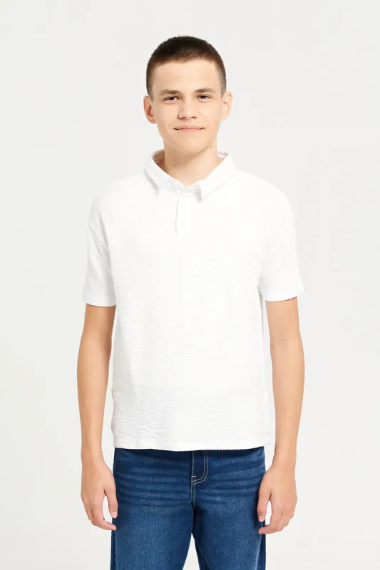 Senior Boys White Jacquard Polo Shirt sold by Redtag