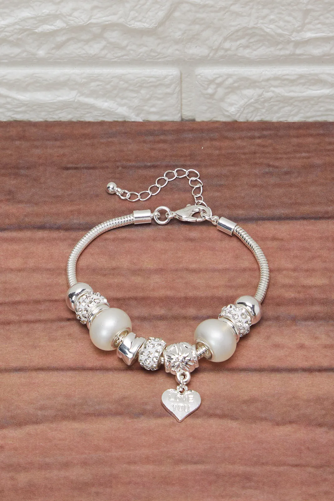 Women Silver Bracelet With Charm sold by Redtag