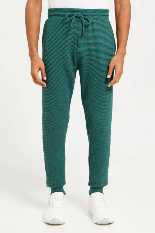 Men Green Ribbed Jogger Pants sold by Redtag
