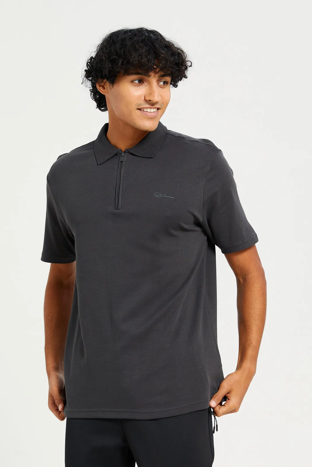 Men Charcoal Placement Print Polo Shirt sold by Redtag