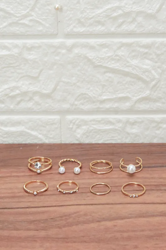 Women Gold Embellished Ring Set (8 Piece) sold by Redtag