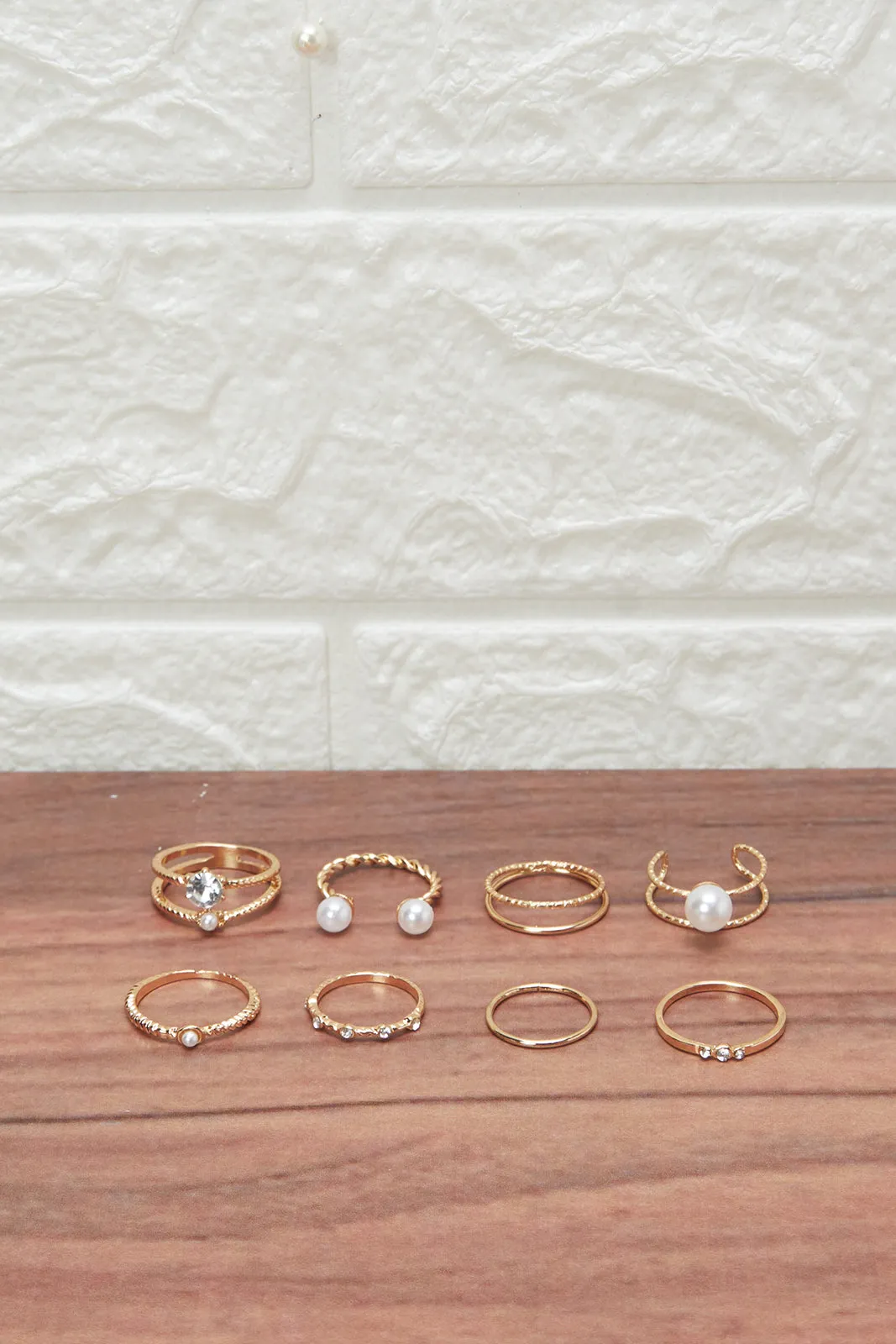 Women Gold Embellished Ring Set (8 Piece) sold by Redtag