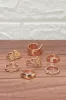Women Gold Embellished Ring Set (7 Piece) sold by Redtag