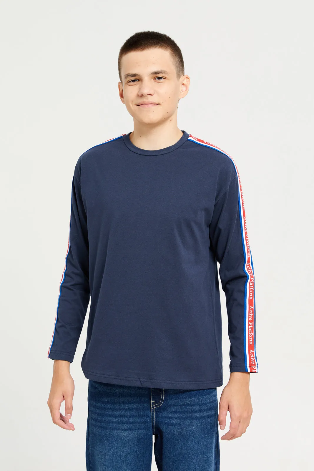 Senior Boys Blue With Printed Sleeves T-Shirt sold by Redtag