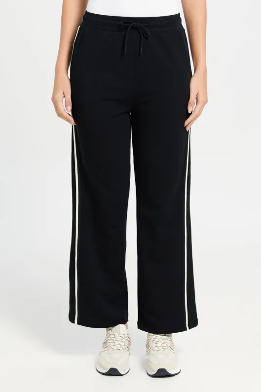 Women Black Active Pant With Ivory Tape Detailing sold by Redtag