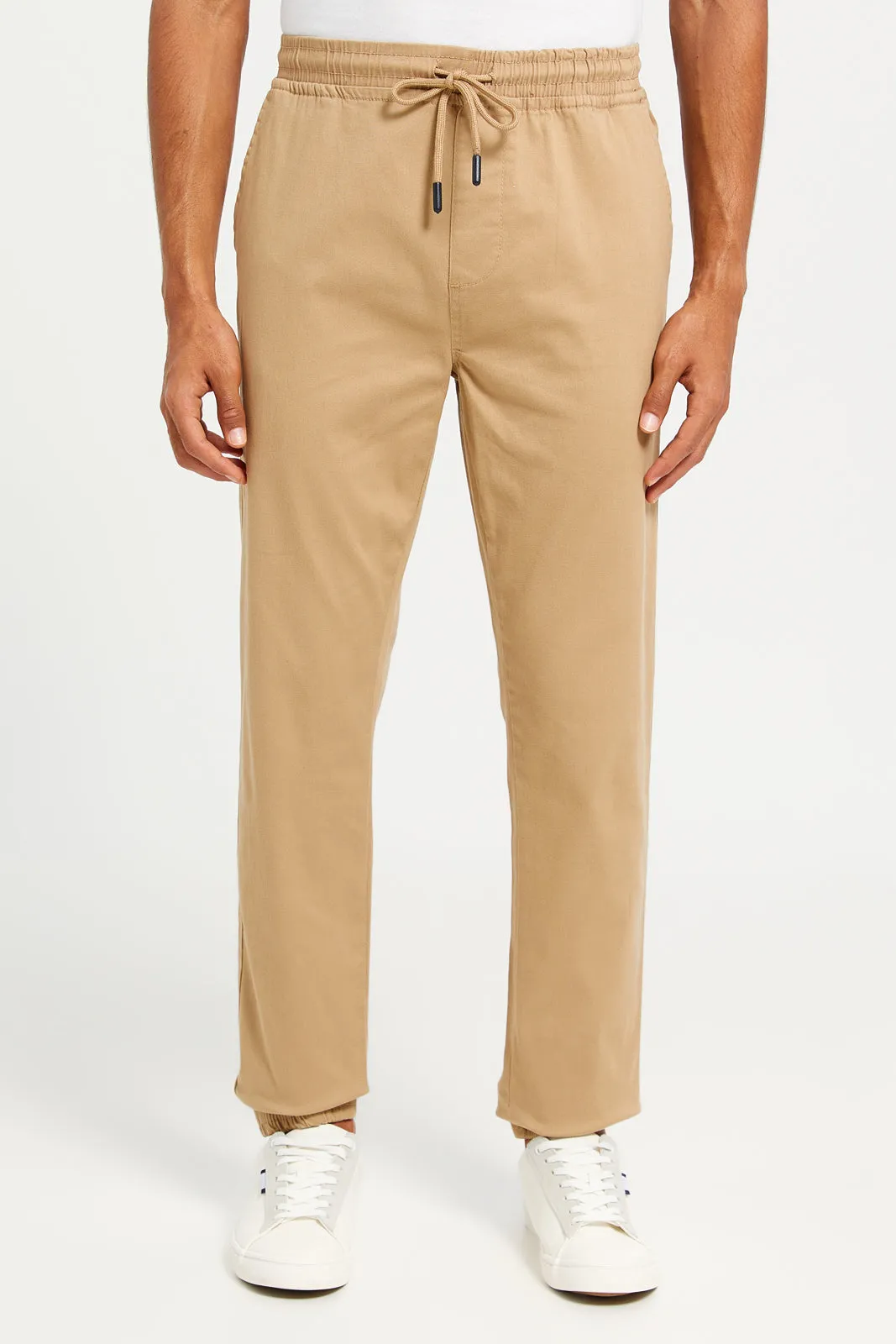 Men Beige Solid Twill Jogger sold by Redtag