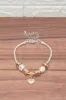 Women Gold Bracelet With Heart Charm sold by Redtag