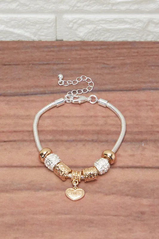 Women Gold Bracelet With Heart Charm sold by Redtag