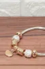 Women Gold Bracelet With Heart Charm sold by Redtag