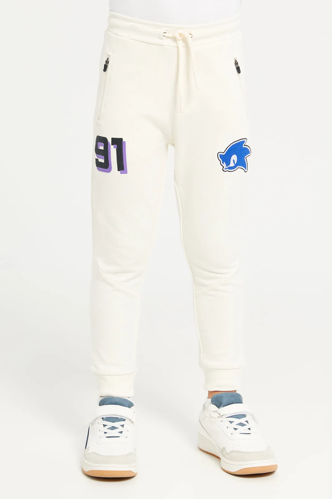 Boys Ivory Sonic Print Track Pants sold by Redtag