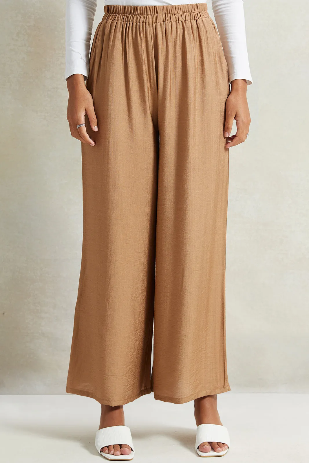 Women Beige Wide Leg Elasticated Waist Trousers sold by Redtag