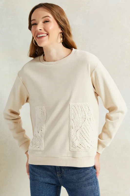 Women Cream Crochet Embroidered Pocket Sweatshirt sold by Redtag