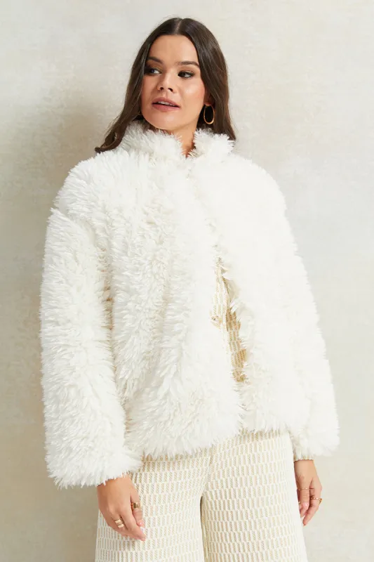 Women White Solid Fur Jacket sold by Redtag