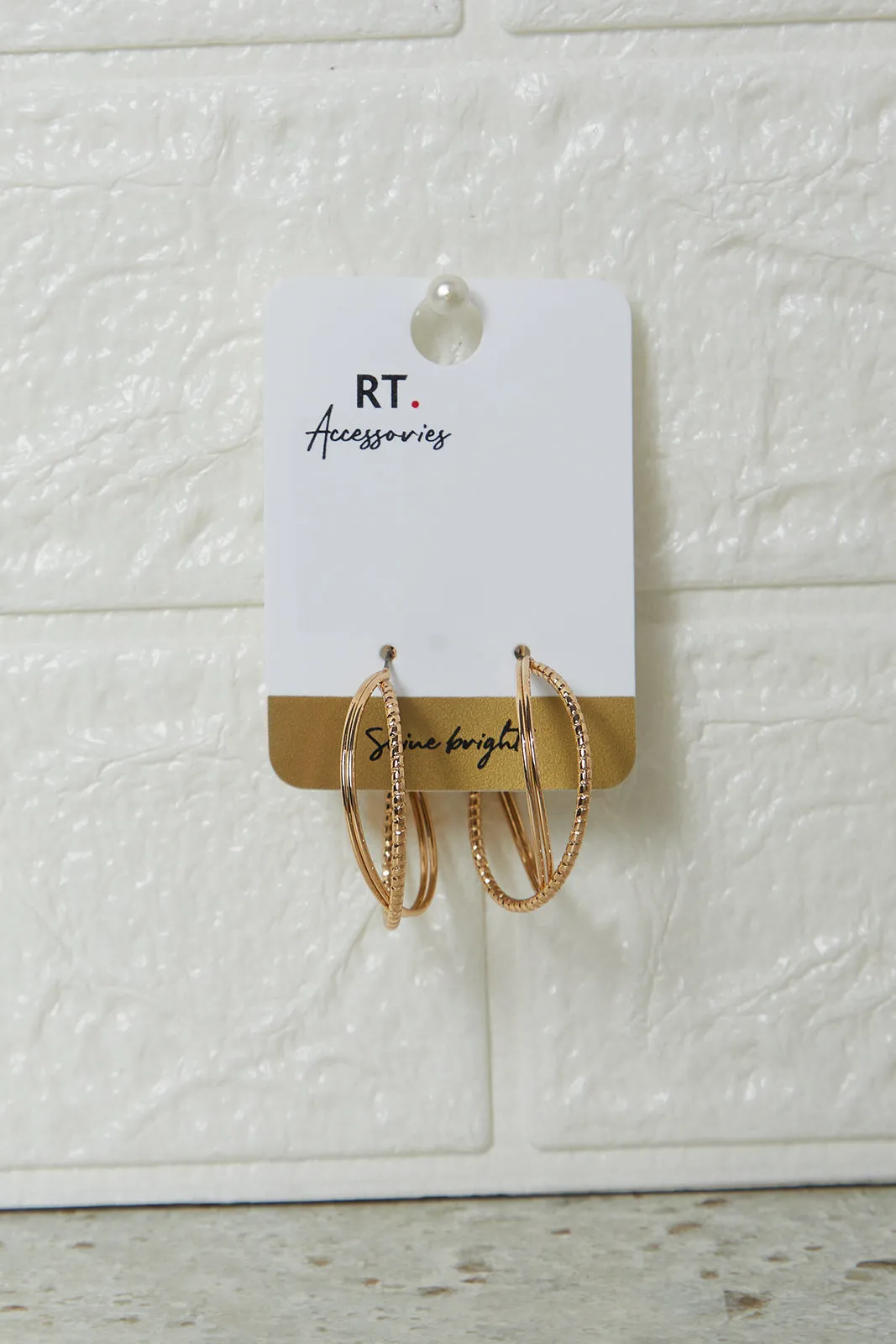 Women Gold Embellished Earrings sold by Redtag