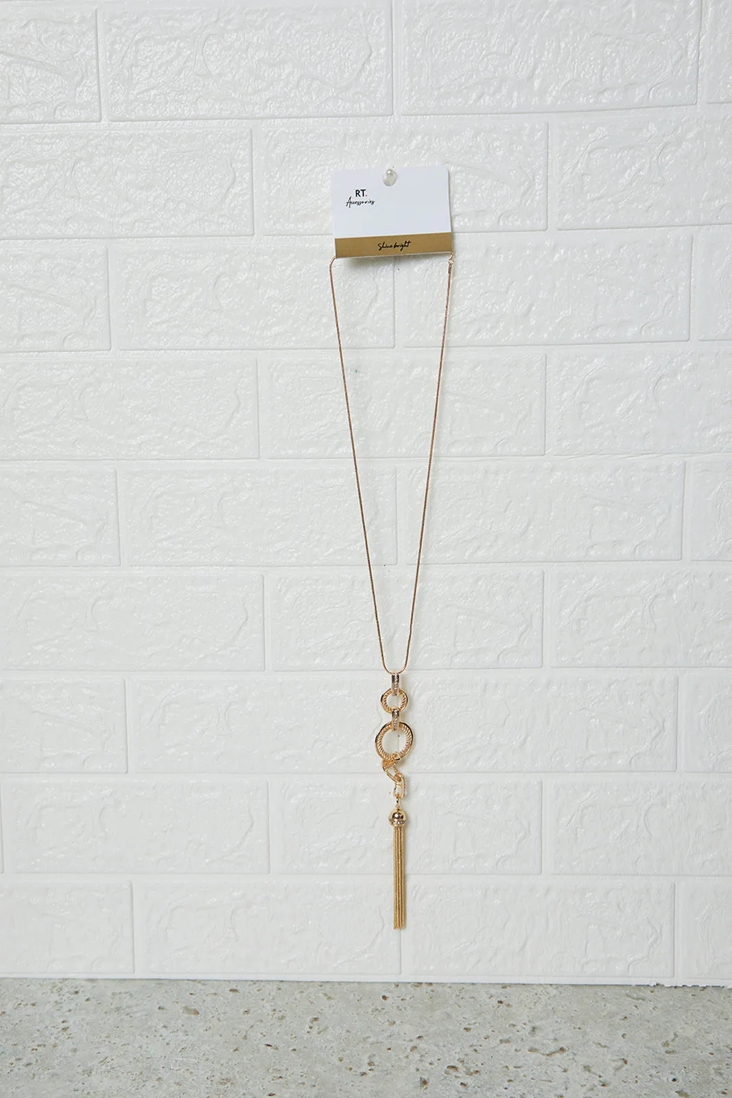 Women Gold Embellished Long Necklace sold by Redtag