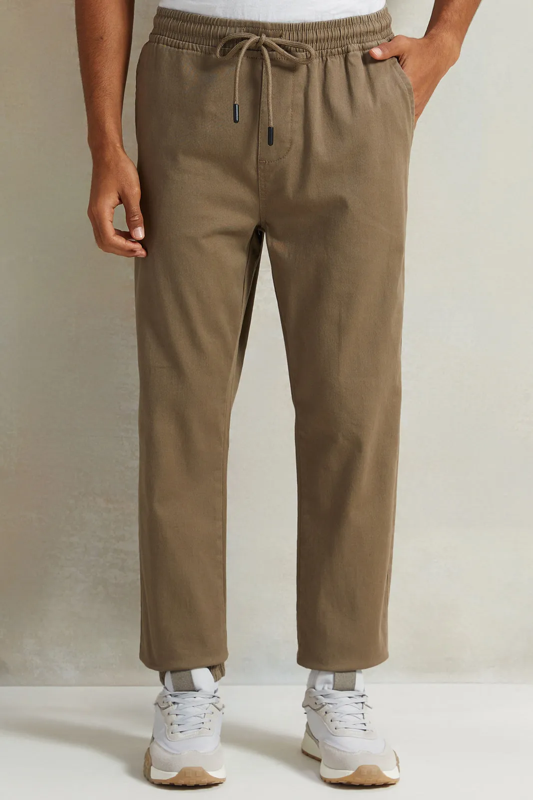 Men Brown Solid Twill Jogger sold by Redtag