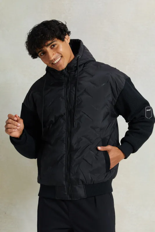 Men Black Tech Puffer Jacket With Knitted Sleeves sold by Redtag