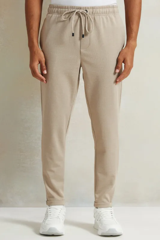 Men Beige Pull-On Trousers sold by Redtag