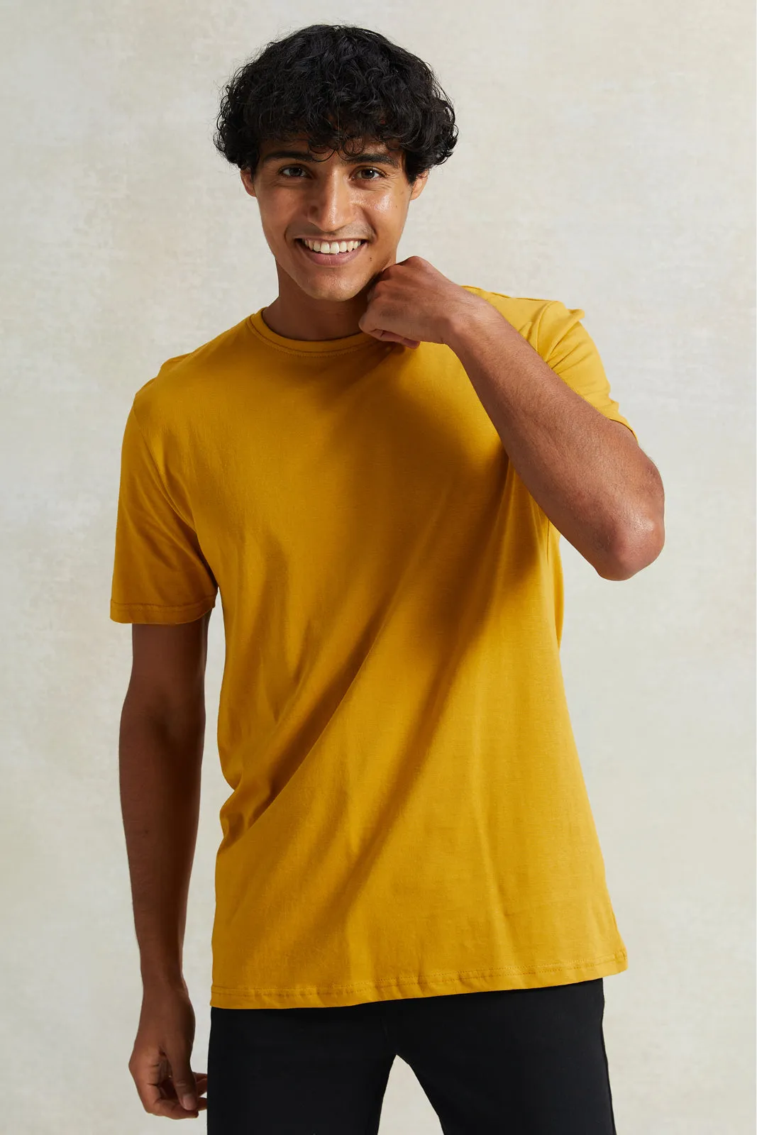Men Mustard Solid T-Shirt sold by Redtag