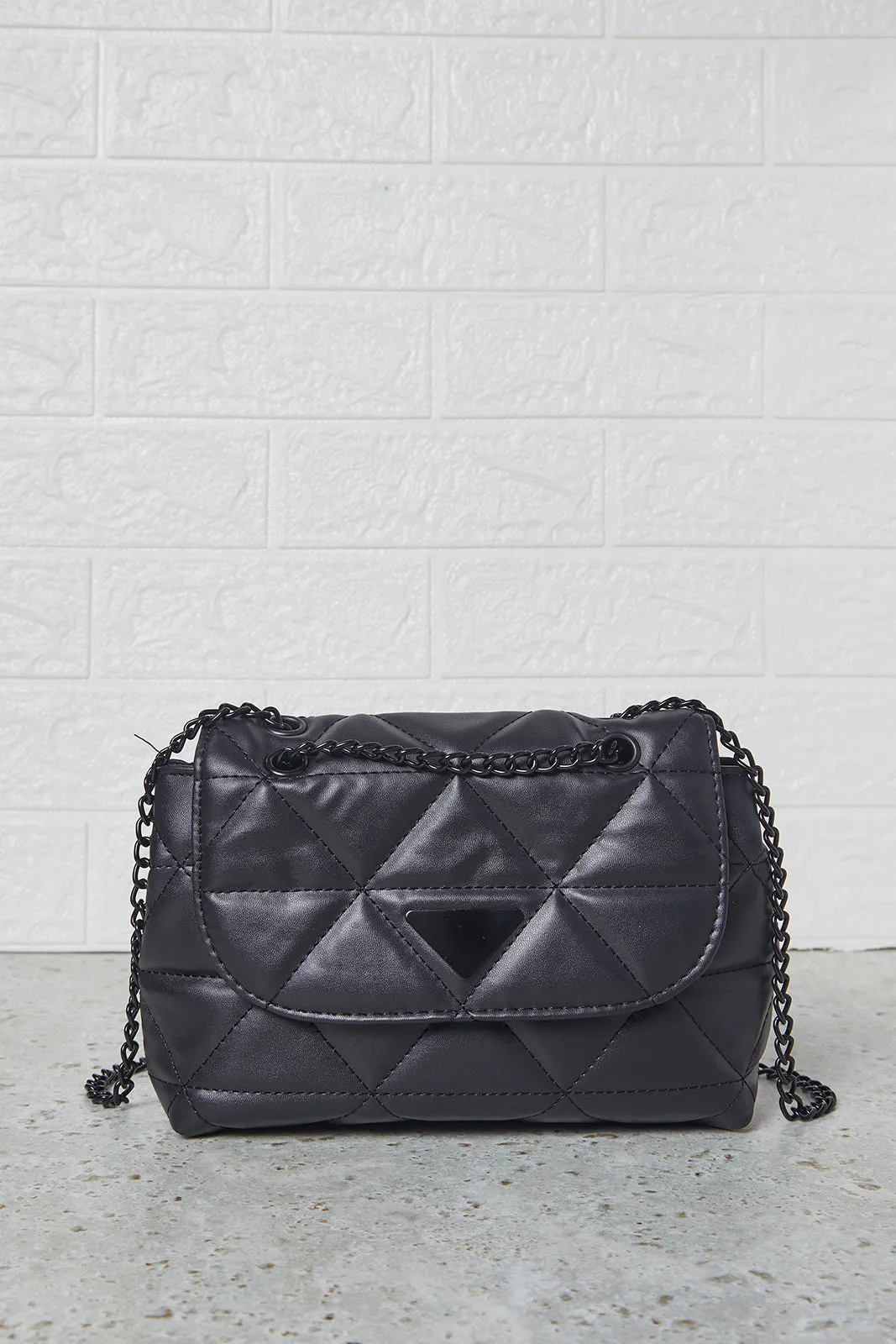 Women Black Quilted Flap Messenger Handbag sold by Redtag