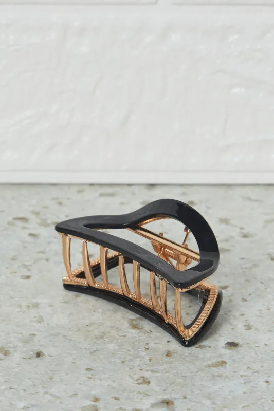 Women Black Hair Claw sold by Redtag