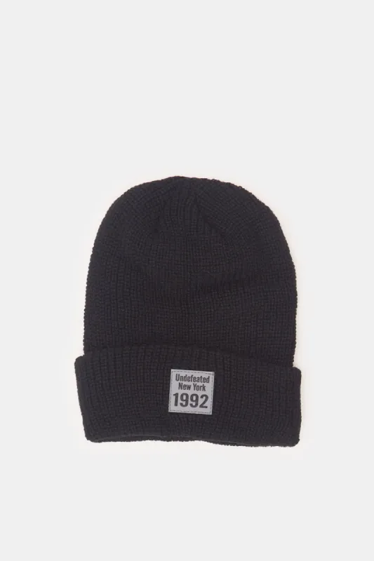 Men Black Solid Knitted Cap sold by Redtag