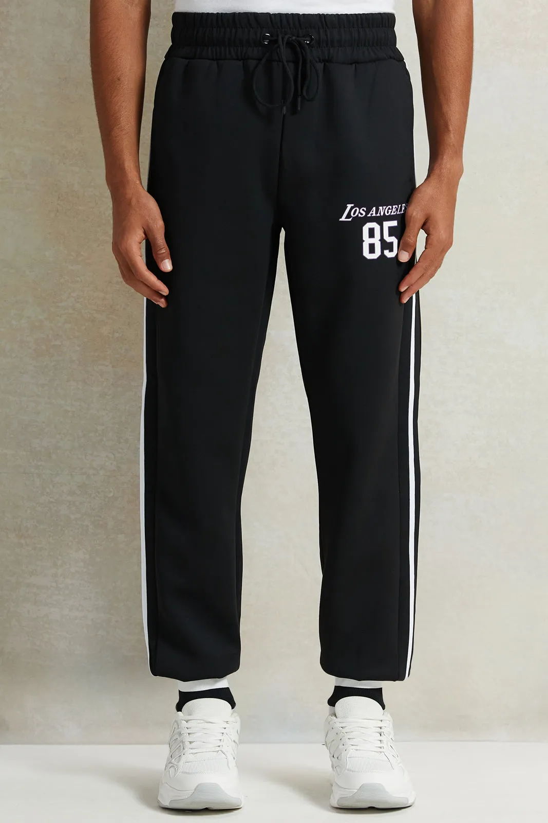 Men Black Printed Basketball Active Pant sold by Redtag