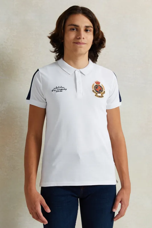 Senior Boys White Printed Polo Shirt sold by Redtag