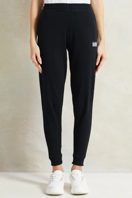 Women Black Printed Active Pants sold by Redtag