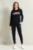 Women Black Printed Active Pants sold by Redtag
