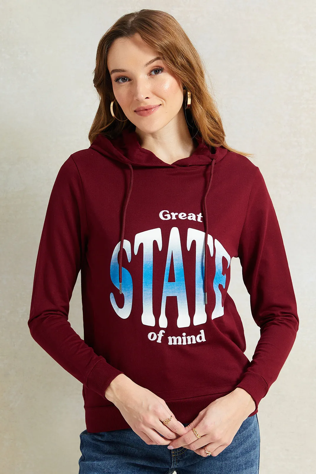 Women Burgundy Print Hooded Sweatshirt sold by Redtag